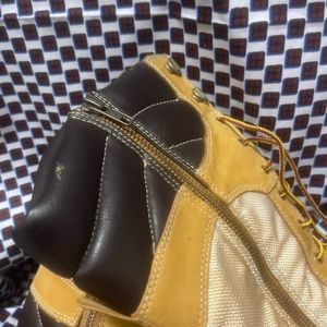 Wedge heels lace up Timberlands boots. Like brand new. Worn 1-3 times.